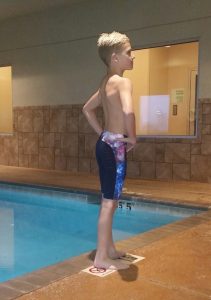 Boy wearing swim jammers