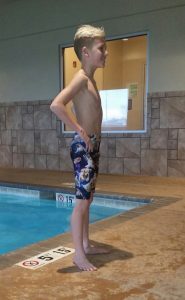 boy wearing swim jammers